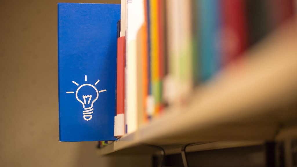 an idea icon on book in a bookshelf